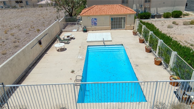 3408 Sunriver Rd Unit 207 B6, Bullhead City, AZ 86429 - view of pool with a patio, a fenced backyard, and an outdoor structure