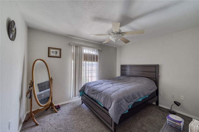 3408 Sunriver Rd Unit 207 B6, Bullhead City, AZ 86429 - carpeted bedroom featuring baseboards, a ceiling fan, and a textured ceiling