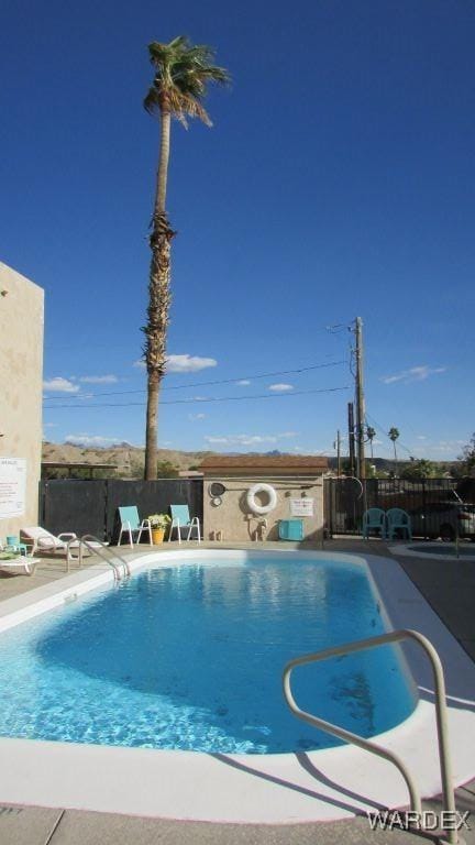 community pool with fence