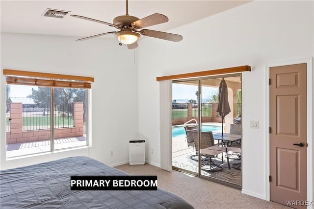 bedroom with carpet floors, access to exterior, baseboards, and visible vents