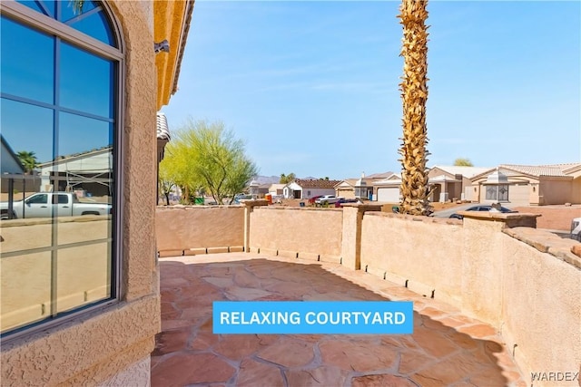 view of patio / terrace with a residential view