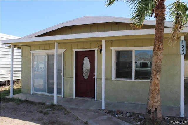 property entrance featuring fence