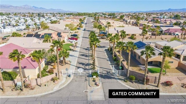 birds eye view of property featuring a residential view and a mountain view