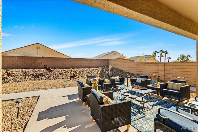 view of patio / terrace featuring a fenced backyard and outdoor lounge area