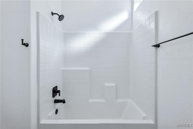 bathroom with shower / bathtub combination