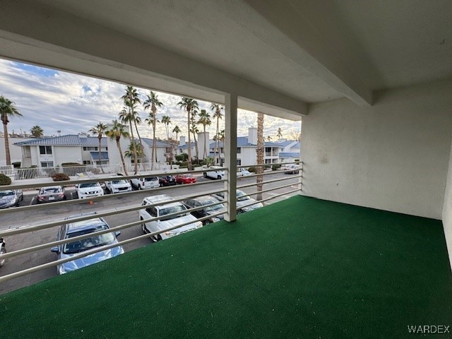 view of patio / terrace with a residential view and a balcony