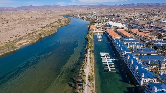 birds eye view of property featuring a residential view and a water view