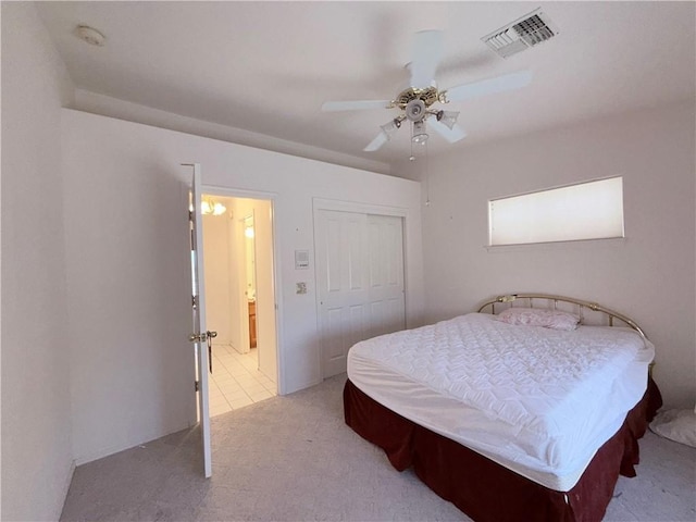 2217 E Emerald River Way, Fort Mohave, AZ 86426 - bedroom featuring a closet, ceiling fan, light carpet, and billiards