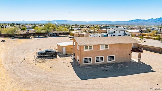 bird's eye view with a residential view and a mountain view