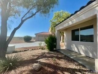 view of yard featuring a garage