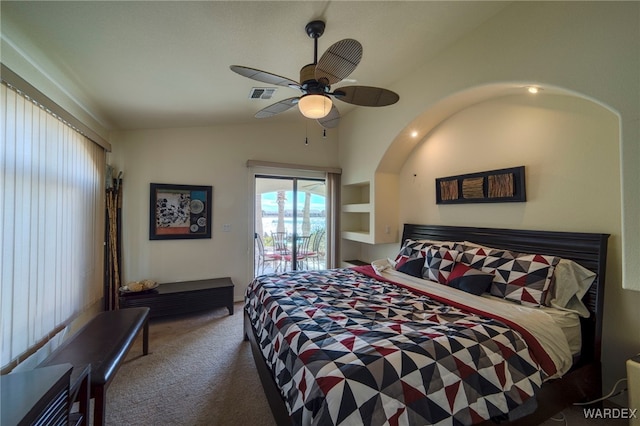 bedroom with visible vents, a ceiling fan, carpet, access to outside, and vaulted ceiling