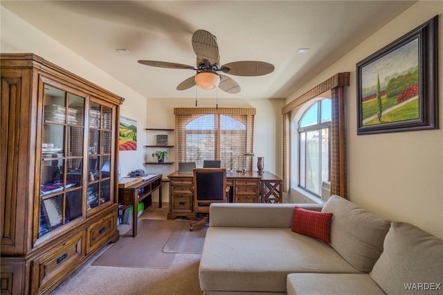 office area featuring carpet flooring and ceiling fan