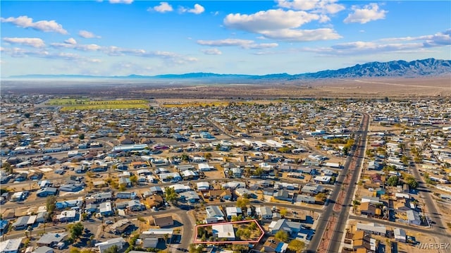 bird's eye view featuring a residential view and a mountain view