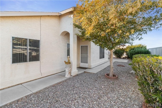 view of home's exterior featuring a patio and stucco siding