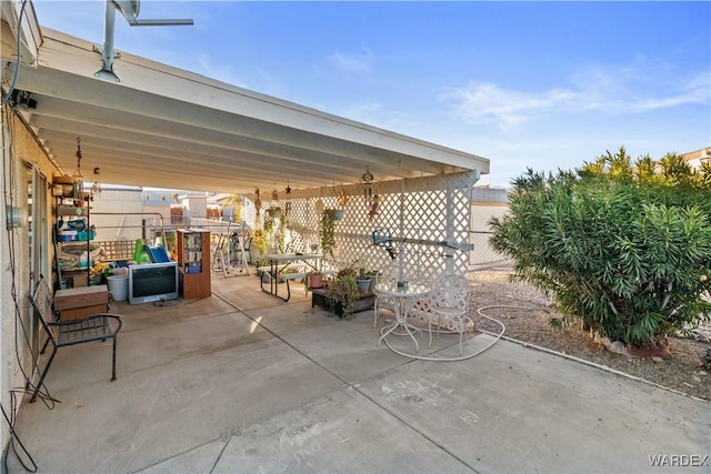 view of patio / terrace with fence