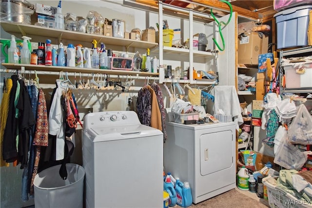 laundry area with washing machine and dryer