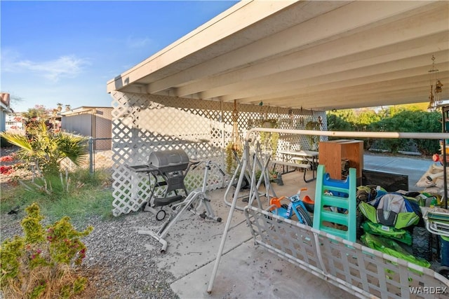 view of patio featuring outdoor dining space and a grill