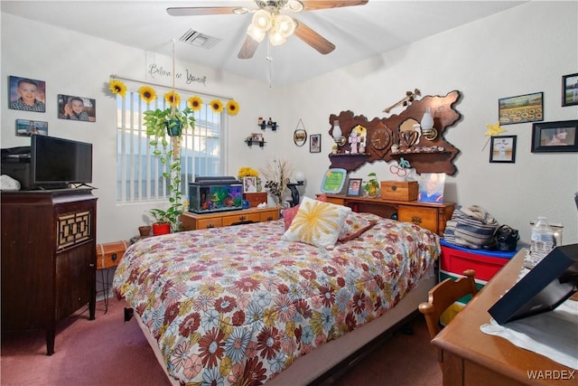 bedroom with ceiling fan, carpet floors, and visible vents