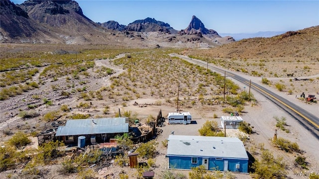 bird's eye view featuring view of desert and a rural view