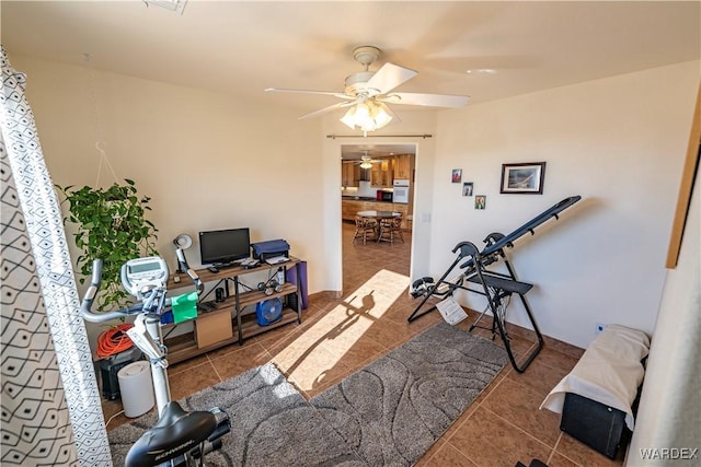 workout area with tile patterned floors