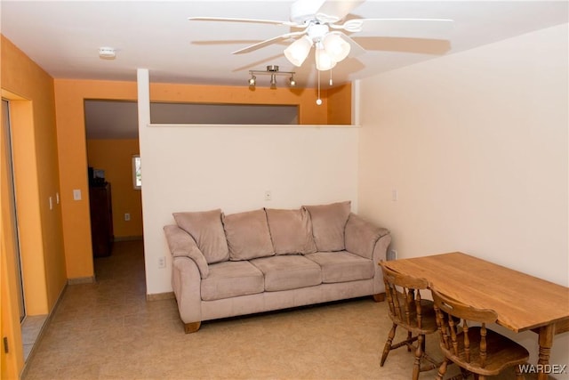 living room with ceiling fan