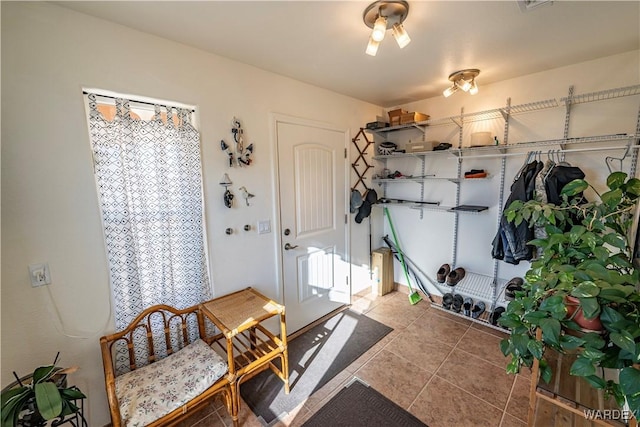 mudroom with tile patterned floors