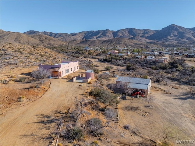 drone / aerial view featuring a mountain view
