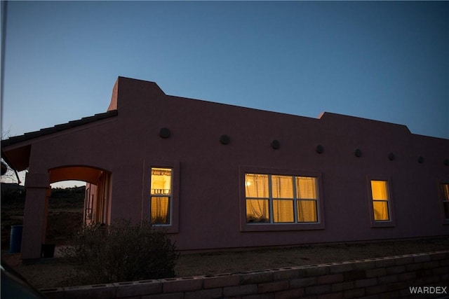 view of home's exterior featuring stucco siding