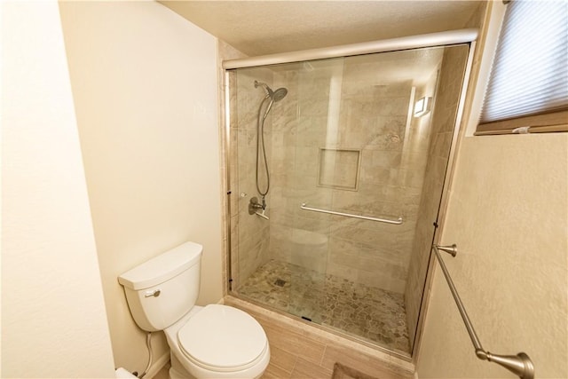 1800 Clubhouse Dr Unit D41, Bullhead City, AZ 86442 - bathroom featuring toilet and a stall shower