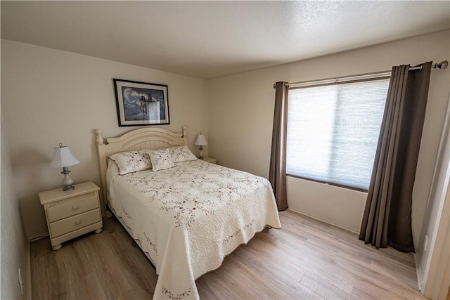 1800 Clubhouse Dr Unit D41, Bullhead City, AZ 86442 - bedroom featuring light wood-style floors and baseboards