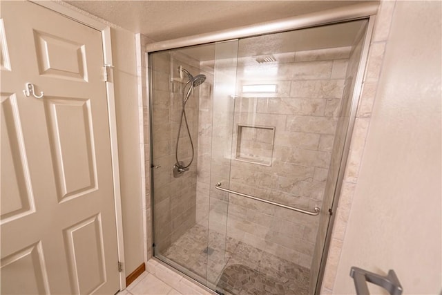 1800 Clubhouse Dr Unit D41, Bullhead City, AZ 86442 - bathroom featuring a stall shower and tile patterned flooring