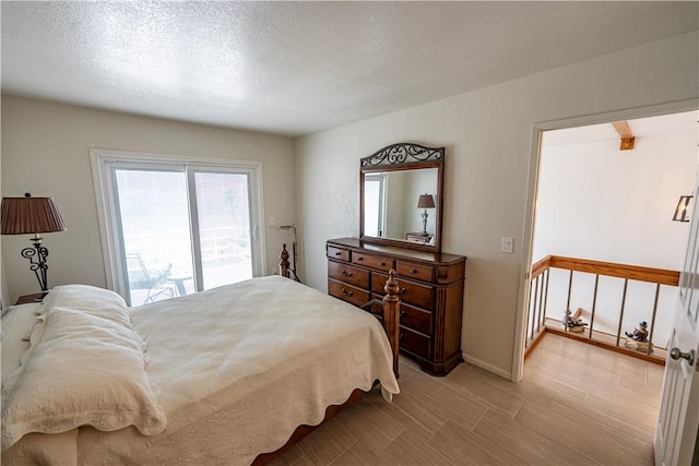 1800 Clubhouse Dr Unit D41, Bullhead City, AZ 86442 - bedroom with baseboards and a textured ceiling