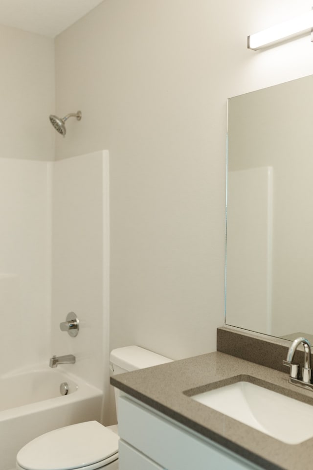 full bathroom featuring toilet, vanity, and shower / bath combination