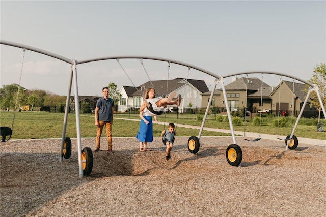 view of play area featuring a lawn