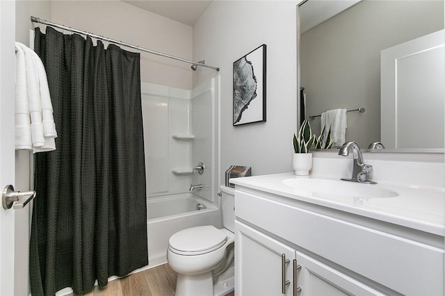 full bathroom with hardwood / wood-style flooring, vanity, toilet, and shower / bathtub combination with curtain