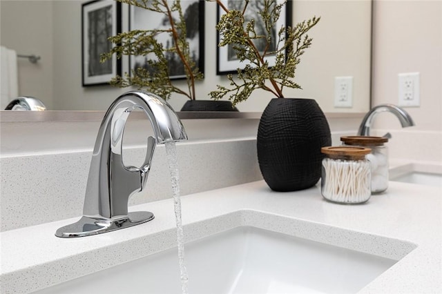 details featuring decorative backsplash and vanity