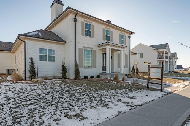 view of front facade with cooling unit