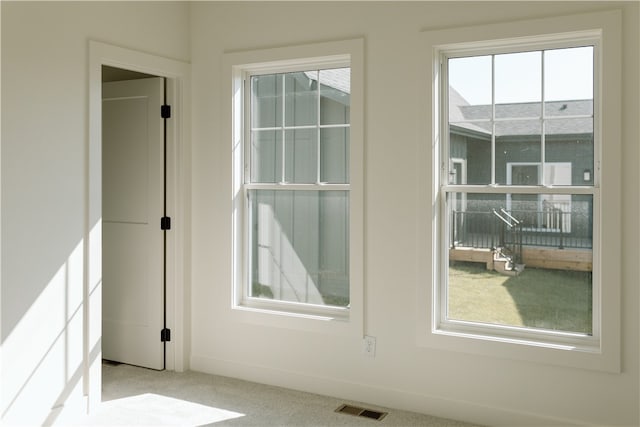 view of carpeted spare room