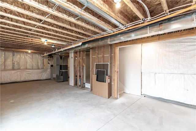 basement with heating unit