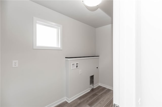 laundry area with hookup for a washing machine, light hardwood / wood-style flooring, and electric dryer hookup