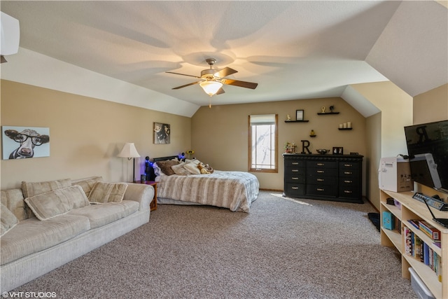 carpeted bedroom featuring ceiling fan and lofted ceiling