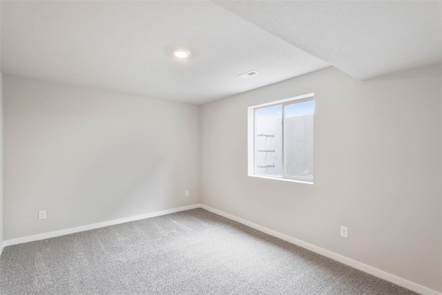 empty room featuring carpet floors