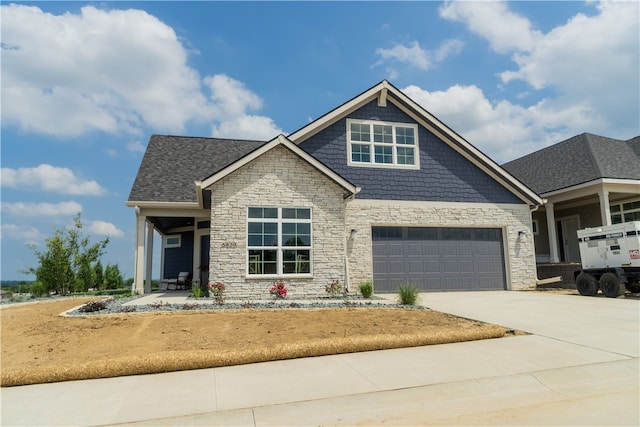 craftsman inspired home featuring a garage