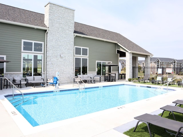 view of swimming pool featuring a patio