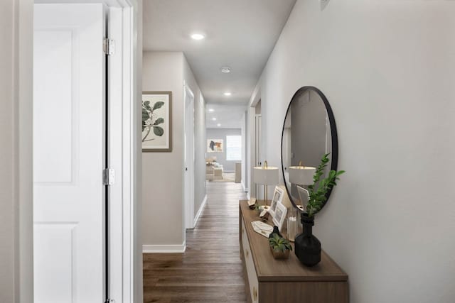 hall with dark hardwood / wood-style floors