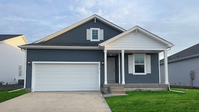 view of front of house featuring a garage, a porch, central air condition unit, and a front lawn