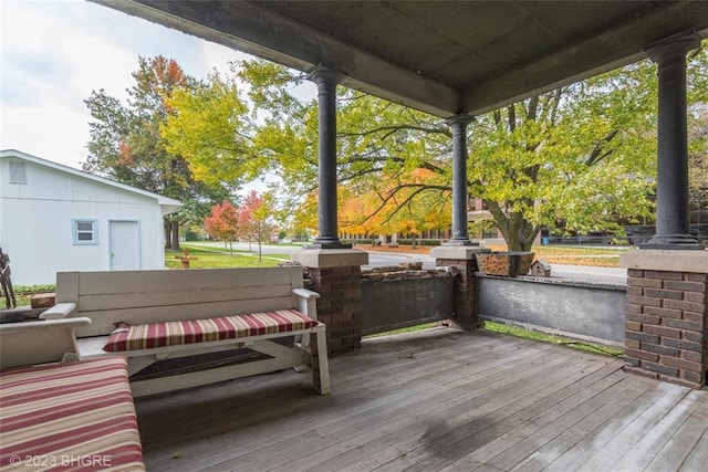 wooden terrace with covered porch