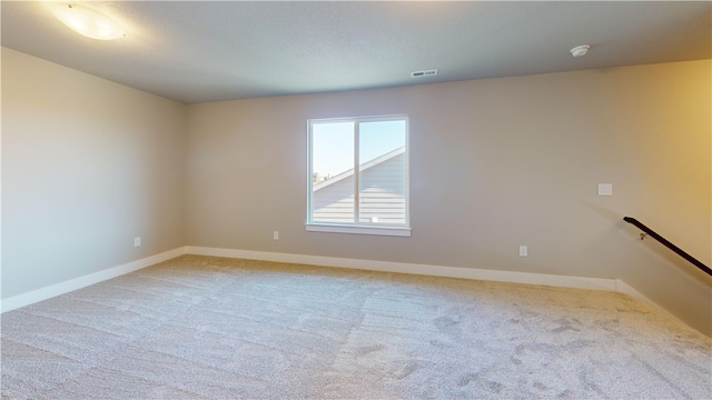 empty room with carpet floors