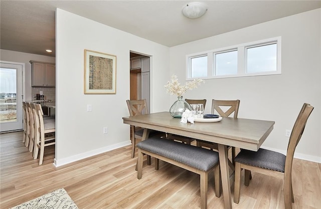 dining space featuring light hardwood / wood-style floors