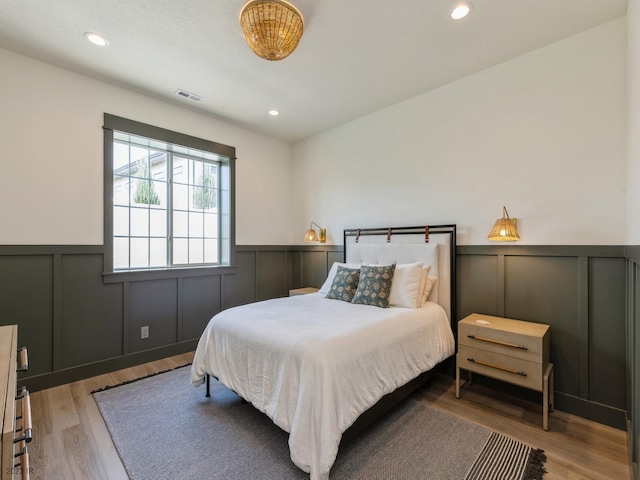 bedroom featuring hardwood / wood-style flooring